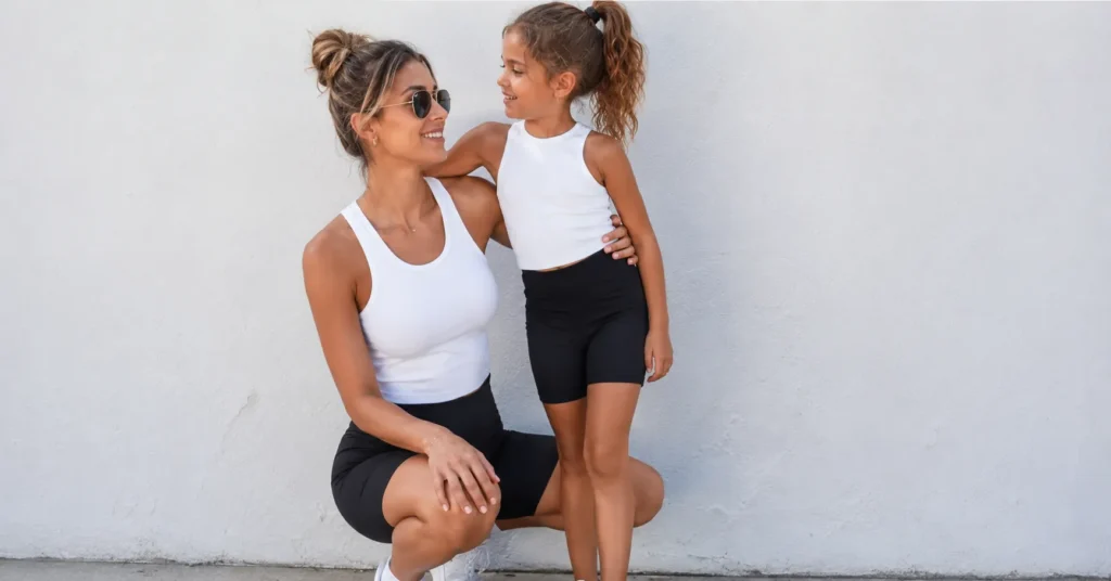 Sporty mom outfits summer style featuring biker shorts and a racerback athletic tank for casual active days.