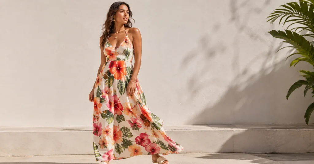 Hawaiian theme outfit featuring a tropical floral maxi dress with breezy island-inspired fashion styling.