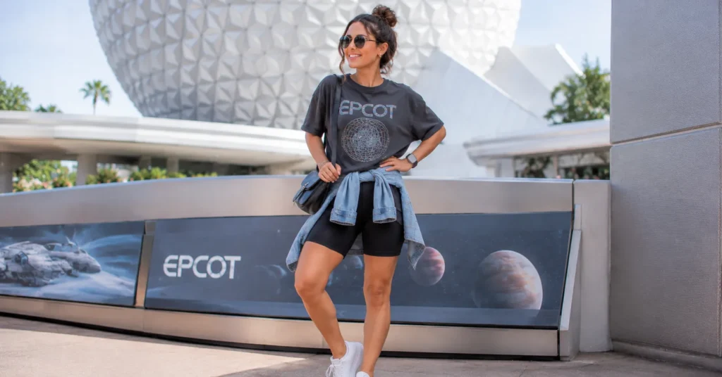 Casual fall epcot outfit ideas with biker shorts and oversized graphic tee.