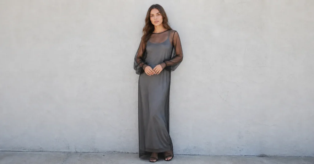 Sheer clothing trends with maxi dress layered over opaque slip