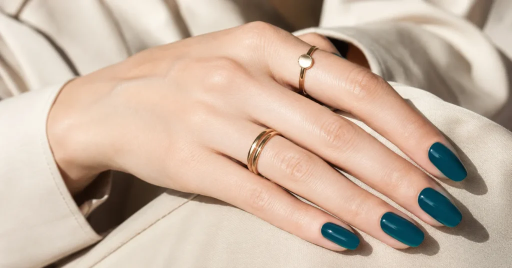 Teal Nail Trends 2026 featuring glossy teal nails with a clean modern manicure style.