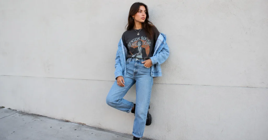 Benson Boone Concert Outfit Ideas: Looks to Match Every Vibe and Venue 3 Benson Boone concert outfit ideas with a vintage graphic tee, high-waisted jeans, and chunky boots.