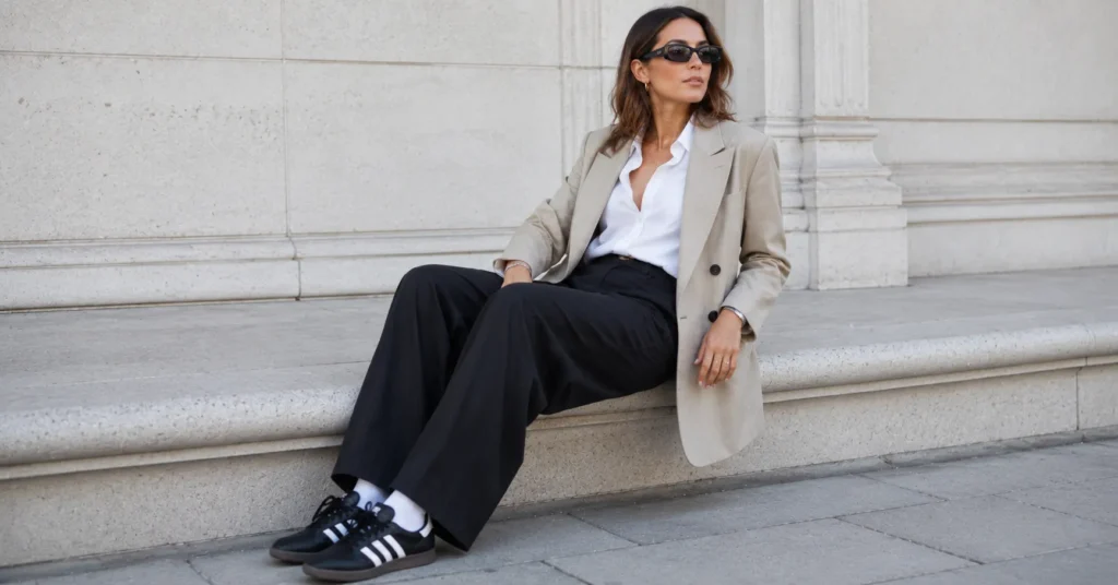 Smart-casual samba adidas outfit featuring tailored trousers, blazer, and Adidas Samba sneakers.