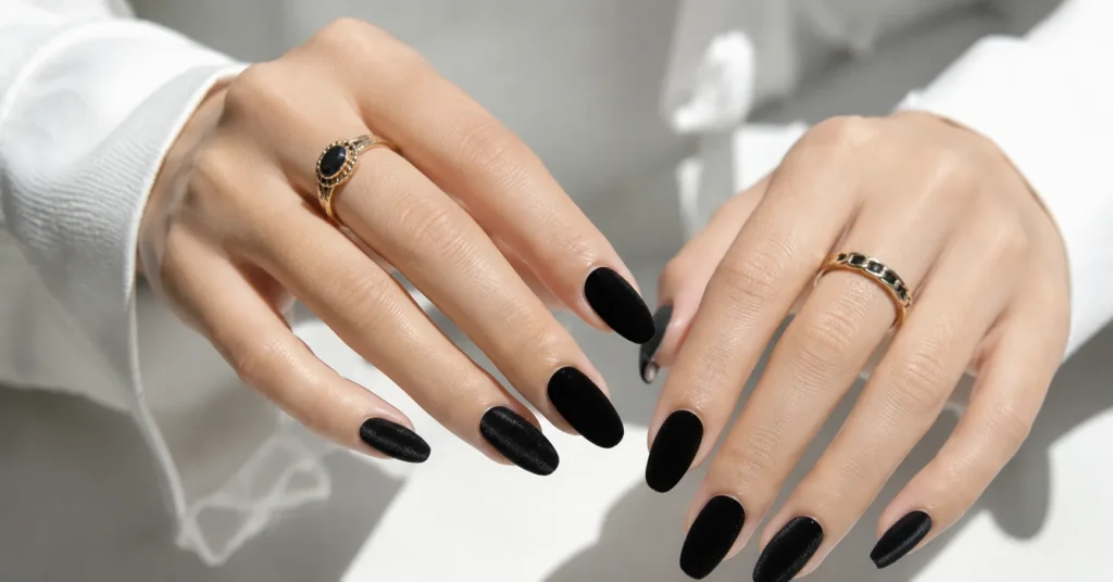 Black velvet nail art ideas with luxurious textured manicure finish.